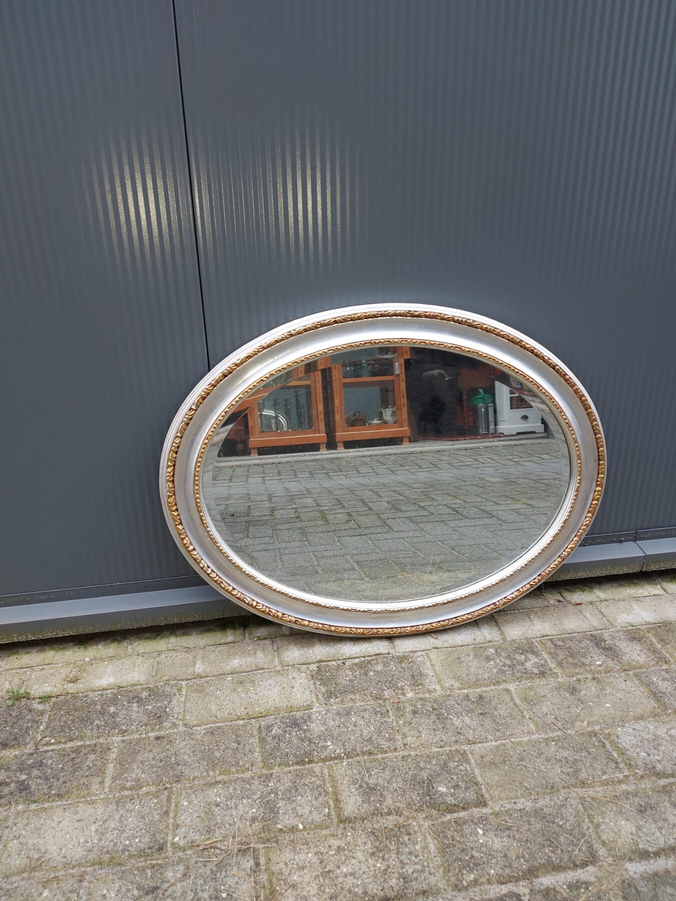 Ovale spiegel met goud en zilver